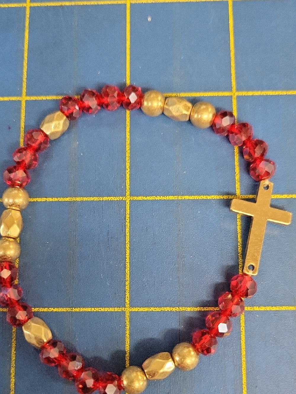 Gold Cross Stretch 8" Bracelet with Red Crystal Beads